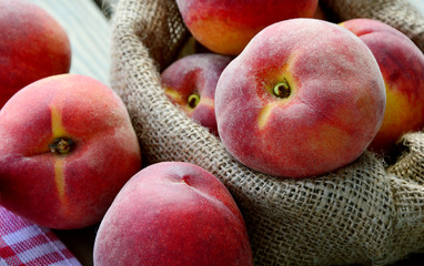 Many Fresh Peach with water drops and shadow on wooden background (German name is Pfirsich)
The amount of sugar in peaches is a lot natural and does not negatively affect health.