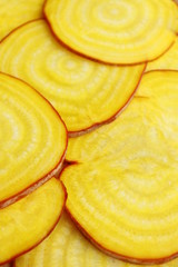 




Beets are yellow slices. Vertical shot.