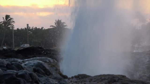 Spouting Horne, blowhole with ocean water spraying through opening in lava rock
