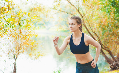 Active beautiful woman running. Healthy lifestyle concept with copyscape