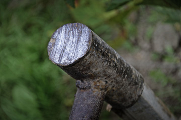 Working in the garden with a sledgehammer, close-up 