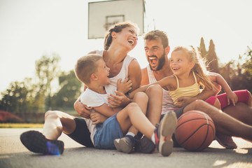 Portrait of happy basket family.