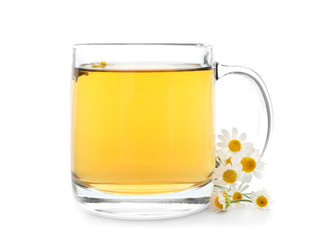 Glass cup of delicious camomile tea on white background