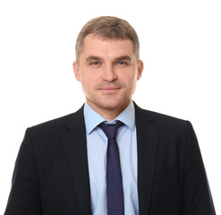 Handsome confident businessman on white background