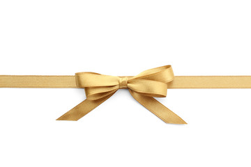 Golden ribbon with bow on white background