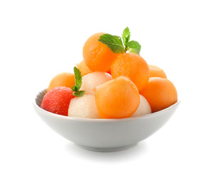 Bowl with tasty melon dessert on white background