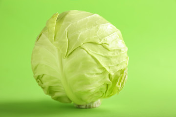 Fresh cabbage on color background