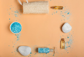 Beautiful spa composition with sea salt on color background