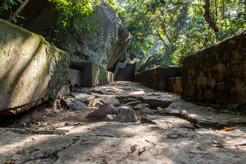Fototapeta na wymiar Shady staircase to Dambulla cave temple, Sri Lanka