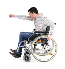 Funny man in wheelchair on white background
