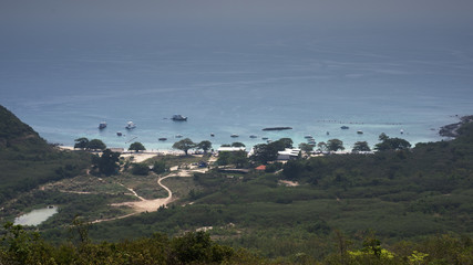 Landscape photo of Samae Beach at Ko Lan island in the Gulf of Thailand near Pattaya. Ko Lan island, with crystal clear turquoise sea water, is one of the most beautiful island in Eastern part of Thai