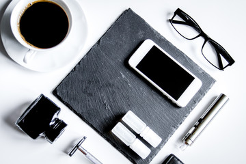 smartphone, electronic cigarette and men's accessories top view