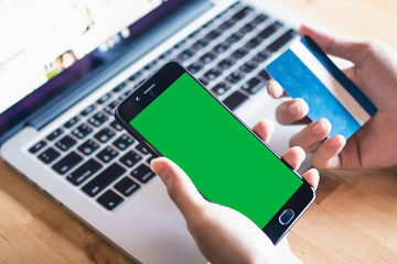 holding Mock-up Green with credit card
