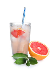 Glass of refreshing grapefruit lemonade on white background