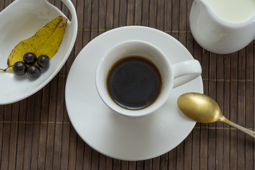 still life with black coffee on a dark background