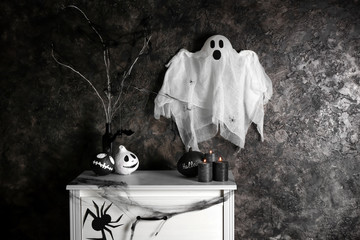 Creative decorations for Halloween party near grey wall