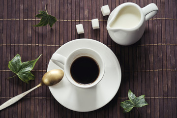 still life with black coffee on a dark background