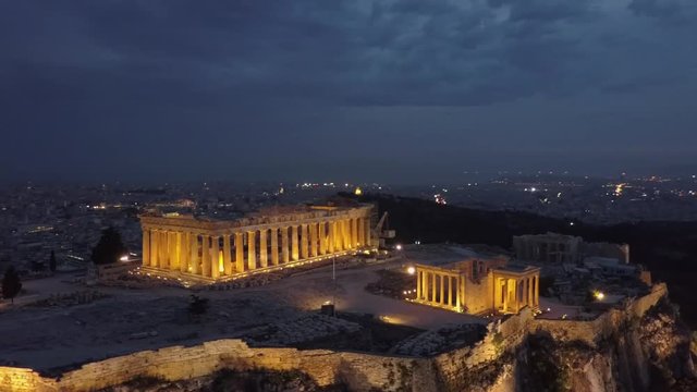Athens Acropolis Parthenon in evening at sunset. beautifully lit up. drone view