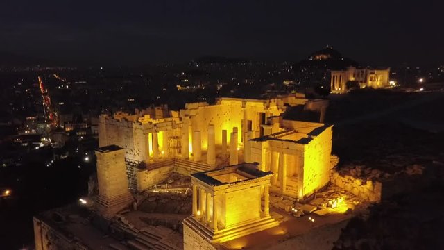 Athens Acropolis Parthenon at night. Beautifully lit up at night. Aerial view