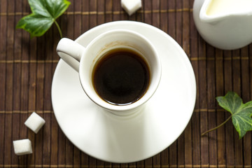 still life with black coffee on a dark background