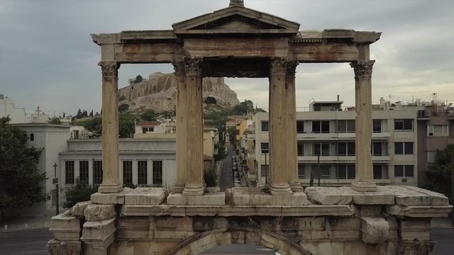 Athens monumental gateway Arch of Hadrian. Acropolis and Parthenon background