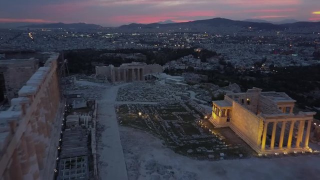 Athens Acropolis Parthenon in evening at sunset. beautifully lit up. drone view