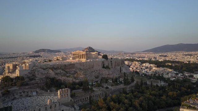 Temple Athens Acropolis and Parthenon in beautiful golden light. Aerial view