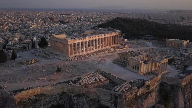 Temple Athens Acropolis and Parthenon in beautiful golden light. Aerial view