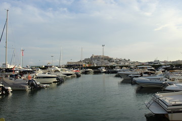 Fototapeta na wymiar Ibiza harbour with the old town of Dalt vila in the background