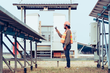 engineer working on checking equipment in solar power plant