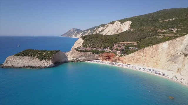 Dream beach from above. Rewarded bay steep cliffs crystal clear blue turquoise