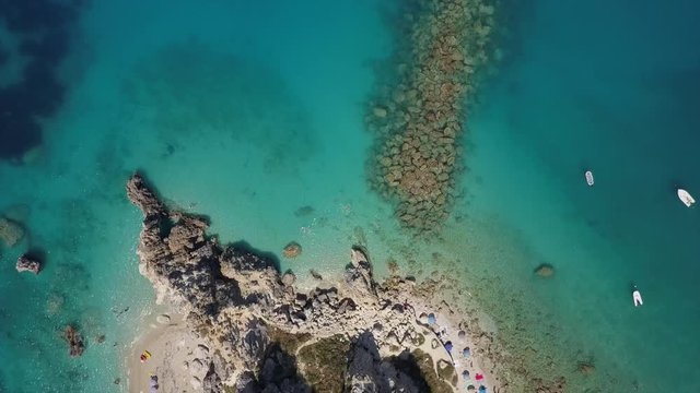 Beautiful colored beach top down drone aerial view.Crystal clear turquoise, blue