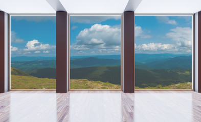 Interior empty office with concrete walls. The building with large windows in the background of the mountains. 3D rendering.