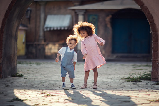 Children Dancing On The Street