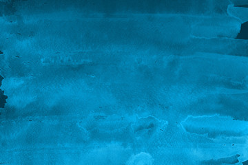 Blue winter watercolor ombre leaks and splashes texture on white watercolor paper background. Painted ice, frost and water.