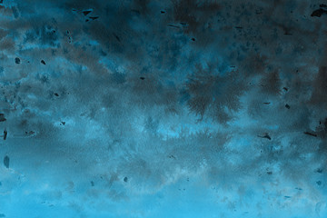 Blue winter watercolor ombre leaks and splashes texture on white watercolor paper background. Painted ice, frost and water.