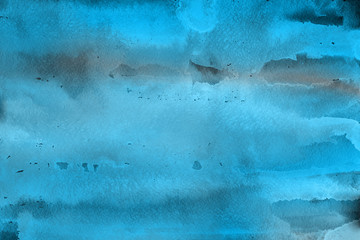 Blue winter watercolor ombre leaks and splashes texture on white watercolor paper background. Painted ice, frost and water.