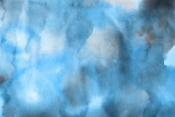 Blue winter watercolor ombre leaks and splashes texture on white watercolor paper background. Painted ice, frost and water.