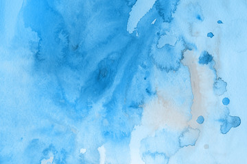 Blue winter watercolor ombre leaks and splashes texture on white watercolor paper background. Painted ice, frost and water.