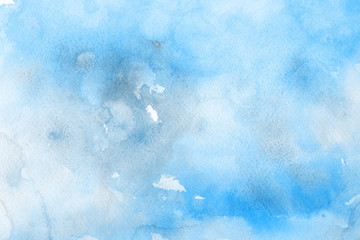 Blue winter watercolor ombre leaks and splashes texture on white watercolor paper background. Painted ice, frost and water.