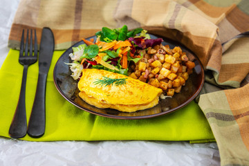 French Omelette with Potatoes, Mushroom and Salad
