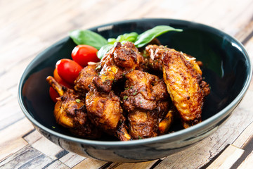 delicious fried chicken wings on table