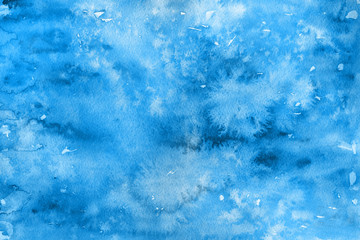 Blue winter watercolor ombre leaks and splashes texture on white watercolor paper background. Painted ice, frost and water.