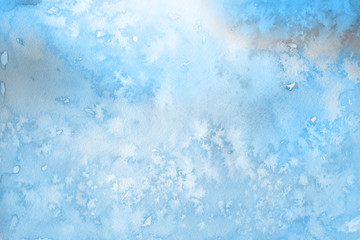 Blue winter watercolor ombre leaks and splashes texture on white watercolor paper background. Painted ice, frost and water.