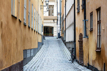 Fototapeta na wymiar bicycle on old street in Stockholm