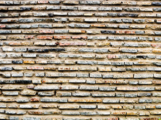 Texture of beige brick on the wall. Background