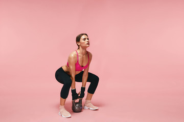 Sport Training. Athletic Woman Doing Squats With Dumbbell