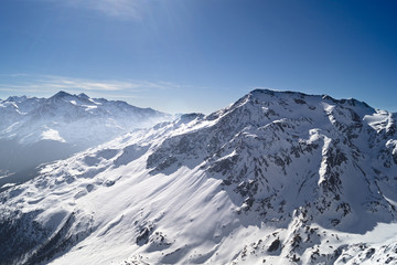 Fototapeta na wymiar Mountain Alps panorama view from top of Bormio in italy