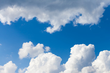 White fluffy clouds in the blue sky