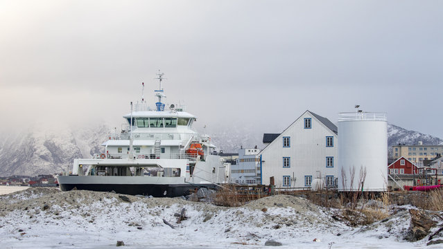 Car ferry at refueling facility in Bronnoysund Northern Norway